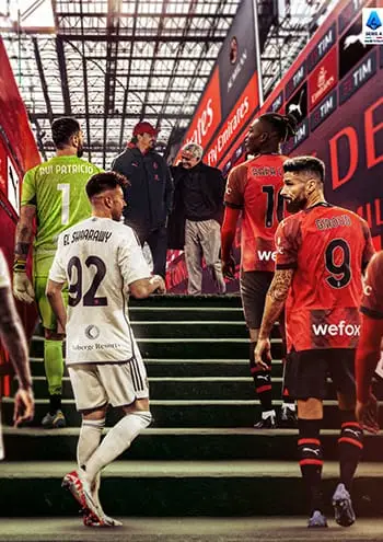 Home Spelers van twee voetbalteams betreden het veld in een stadion met een groot glazen plafond. Op de voorgrond is een speler in een wit shirt met de naam El Shaarawy en nummer 92 te zien die de trap afdaalt, wat lijkt op momenten die fans via IPTV Abonnement hebben meegemaakt. Andere spelers in rode en zwarte uniformen volgen.